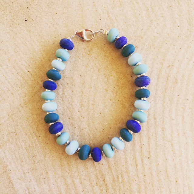 Etched blue glass bead bracelet