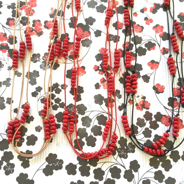 Handmade red glass beads on leather necklaces 